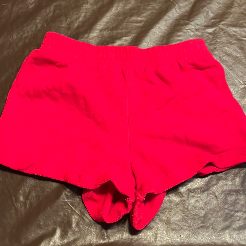 Red shorts with Terry cloths at the top and bottom